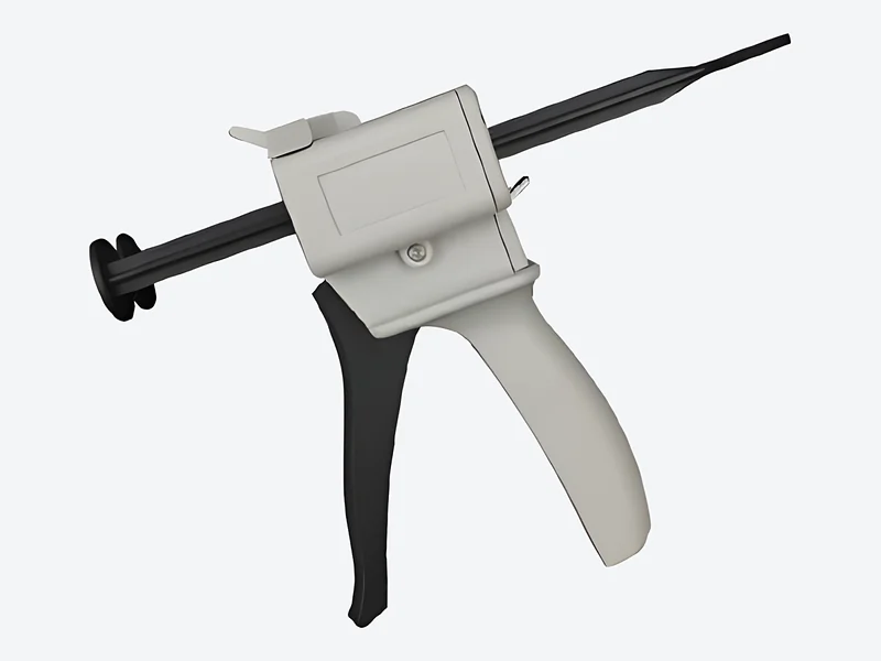 Manual two-component cartridge applicator with a light gray body, black trigger and long plunger rod