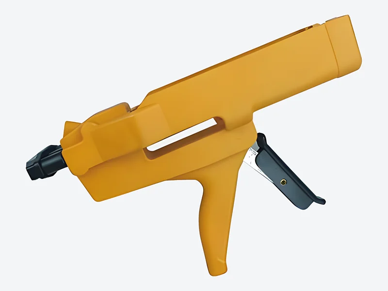 Manual two-component cartridge applicator with a yellow body and black trigger