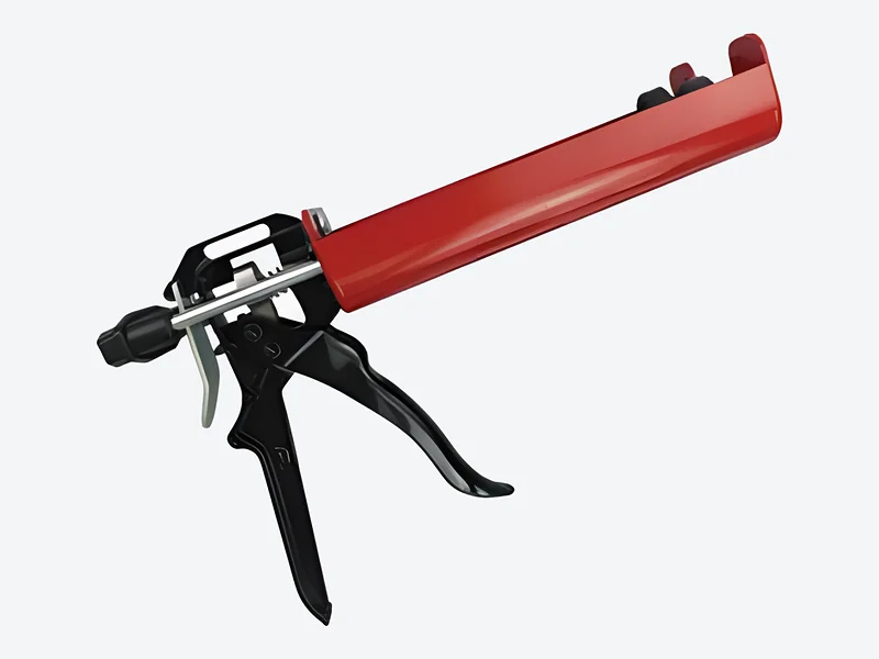 Manual two-component cartridge applicator with a red cartridge frame and black trigger and handle