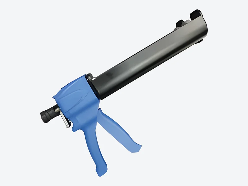 Manual two-component cartridge applicator with a blue handle and trigger and a dark metal barrel