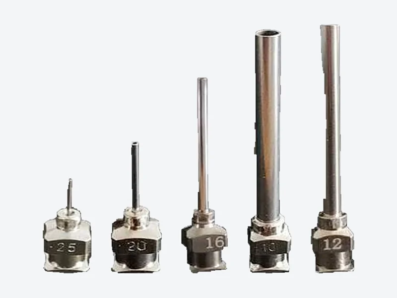 Five all-metal dispensing needles in increasing lengths and bores, with the gauge number stamped on each hub