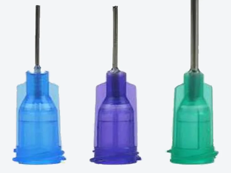 Show a close-up: Close-up of translucent blue, purple and teal plastic hubs with stainless steel tubes